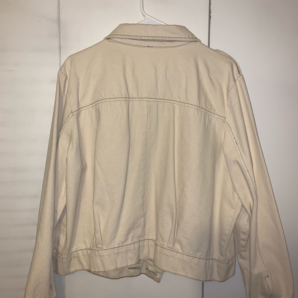 Brand new never worn ivory jean jacket.